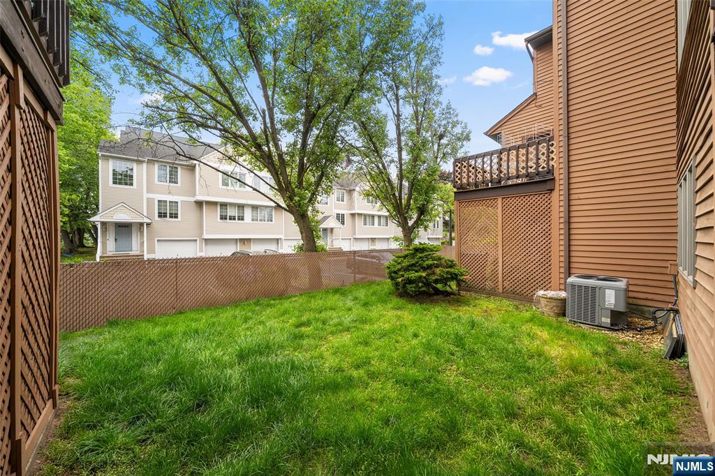 140 Allwood Road, Unit C Clifton, NJ 07012 - Photo 30 of 31 a view of backyard of house with green space