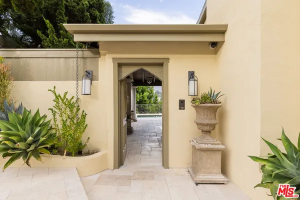 a view of house and chair in the patio