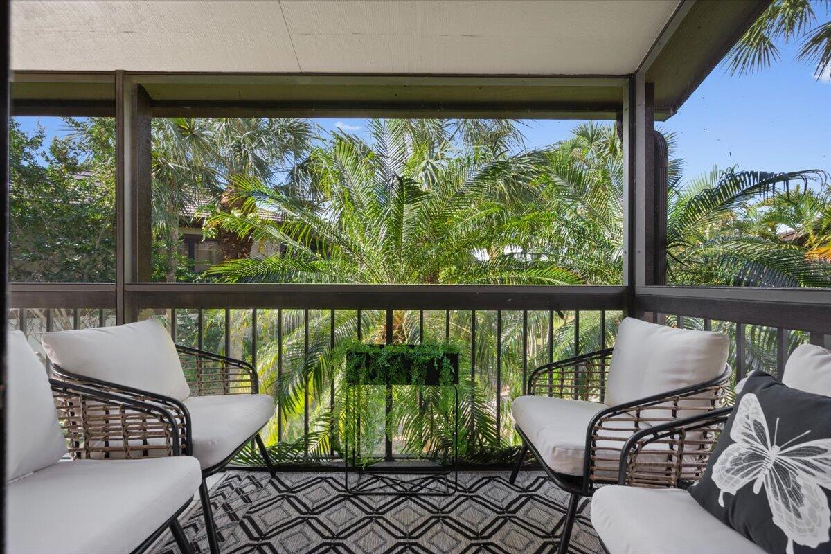 13334 Polo Club Road, Unit 332 Wellington, FL 33414 - Photo 18 of 19 Main Balcony / Screen Enclosure