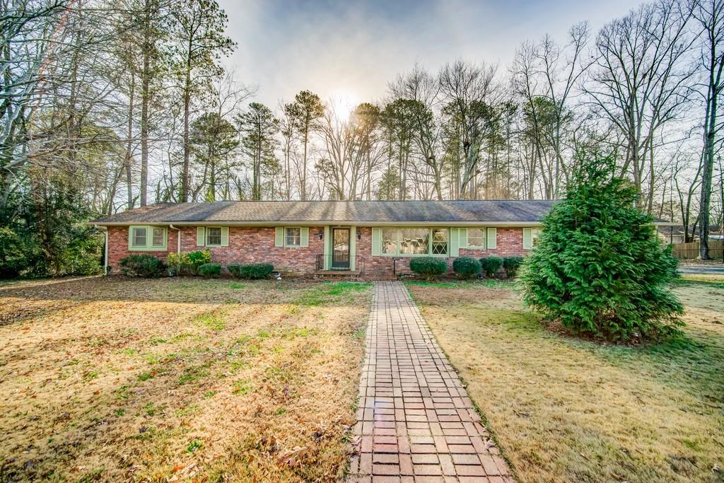 7 Randolph Drive Rome, GA 30165 - Photo 1 of 1 a front view of a building with a garden