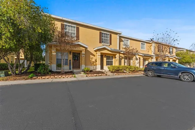 a front view of a house with parking