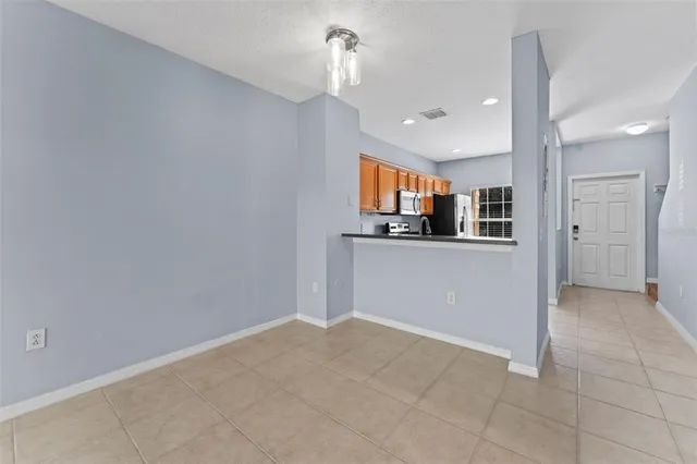 a view of a kitchen and a window