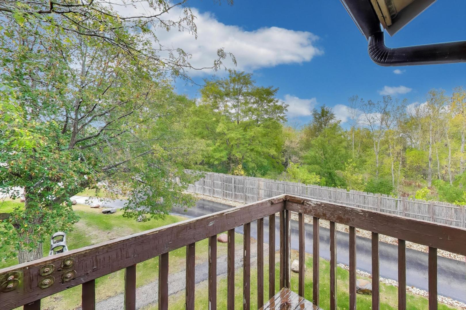13 St Thomas Colony Street, Unit 7 Fox Lake, IL 60020 - Photo 14 of 16 a view of a balcony with an outdoor space