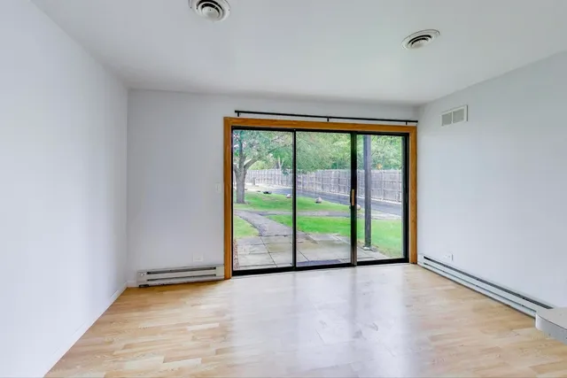 a view of a room with large window