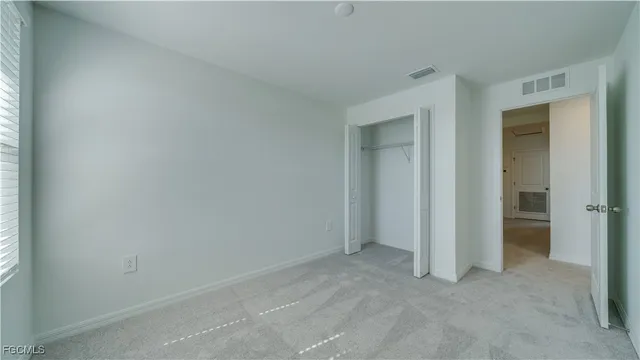 an empty room with closet