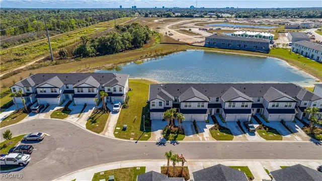 an aerial view of a house with a swimming pool