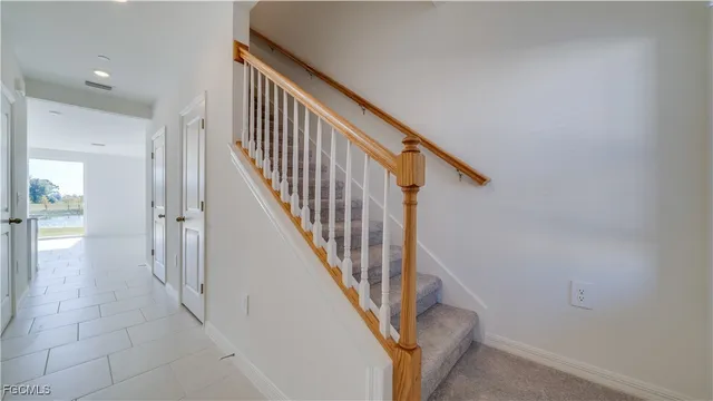 a view of staircase with white walls and white walls