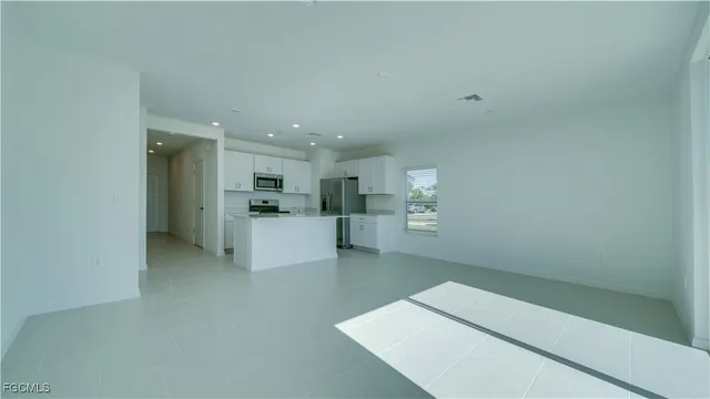 a view of kitchen with wooden floor