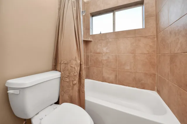 a bathroom with a sink vanity and a mirror