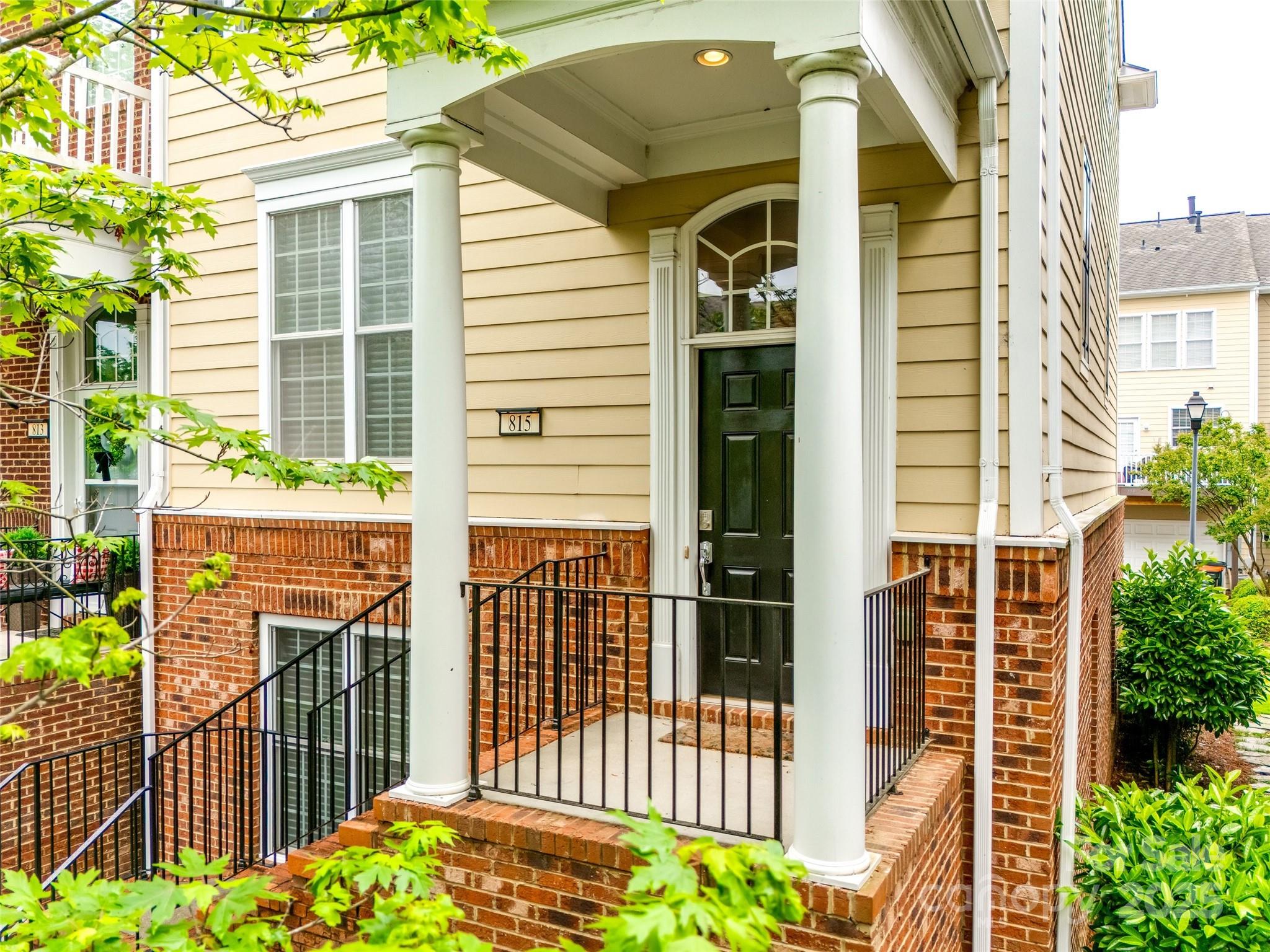 a front view of a house with a porch