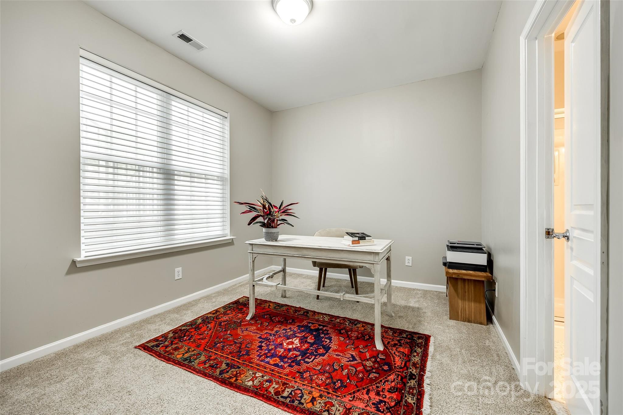 815 Granby Drive Fort Mill, SC 29708 - Photo 14 of 30 a view of a room with a window and wooden floor