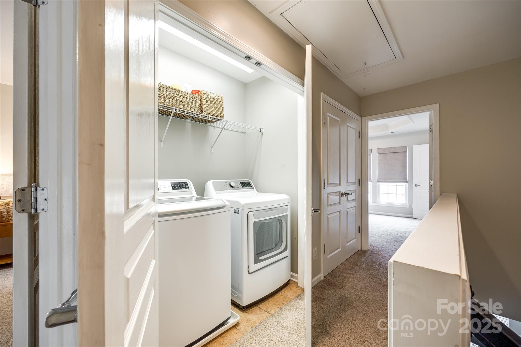 815 Granby Drive Fort Mill, SC 29708 - Photo 16 of 30 a view of a hallway with washer and dryer