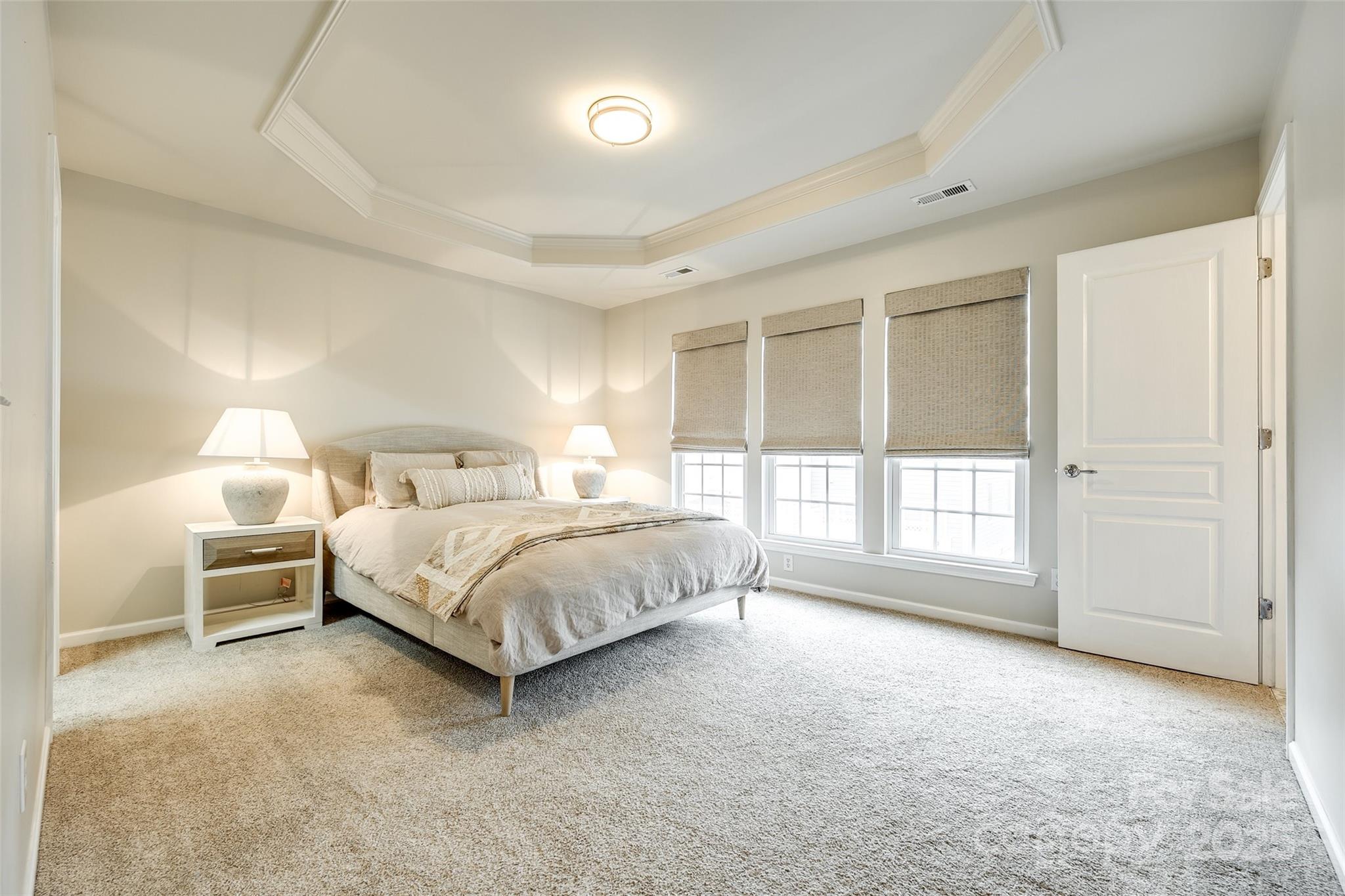 815 Granby Drive Fort Mill, SC 29708 - Photo 17 of 30 a bedroom with a bed and a large window