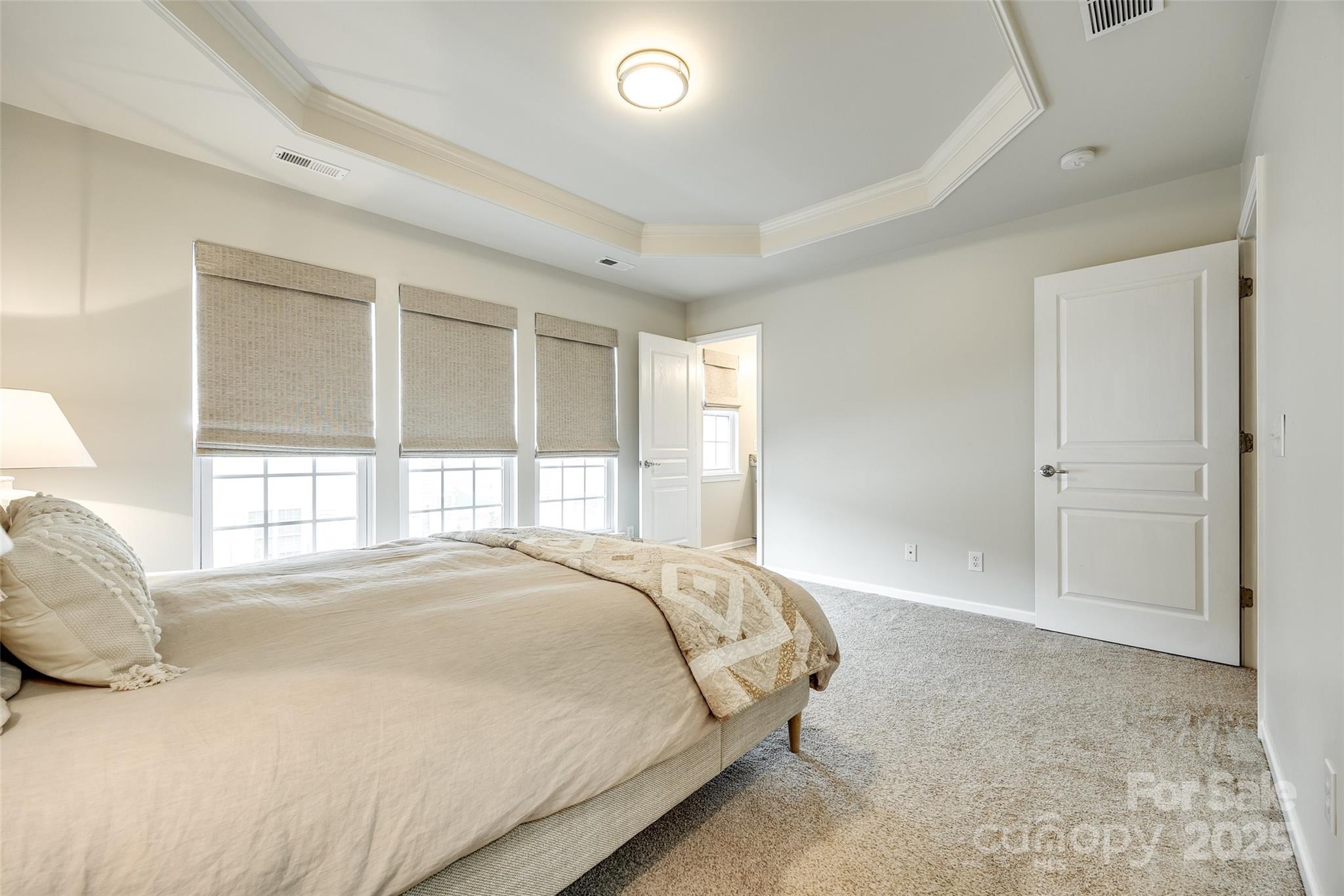 815 Granby Drive Fort Mill, SC 29708 - Photo 18 of 30 a bedroom with a bed and a large window