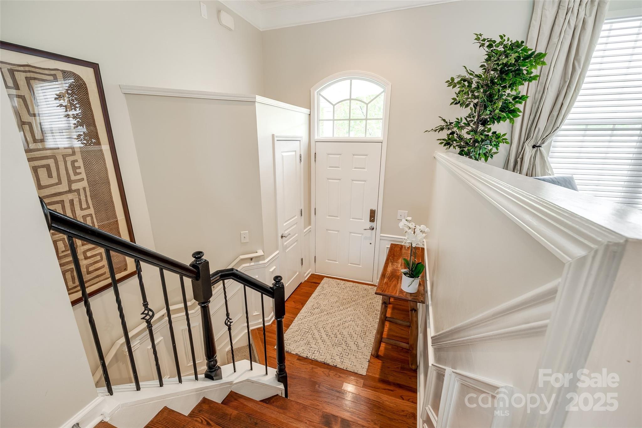 815 Granby Drive Fort Mill, SC 29708 - Photo 4 of 30 a view of an entryway with wooden floor and door