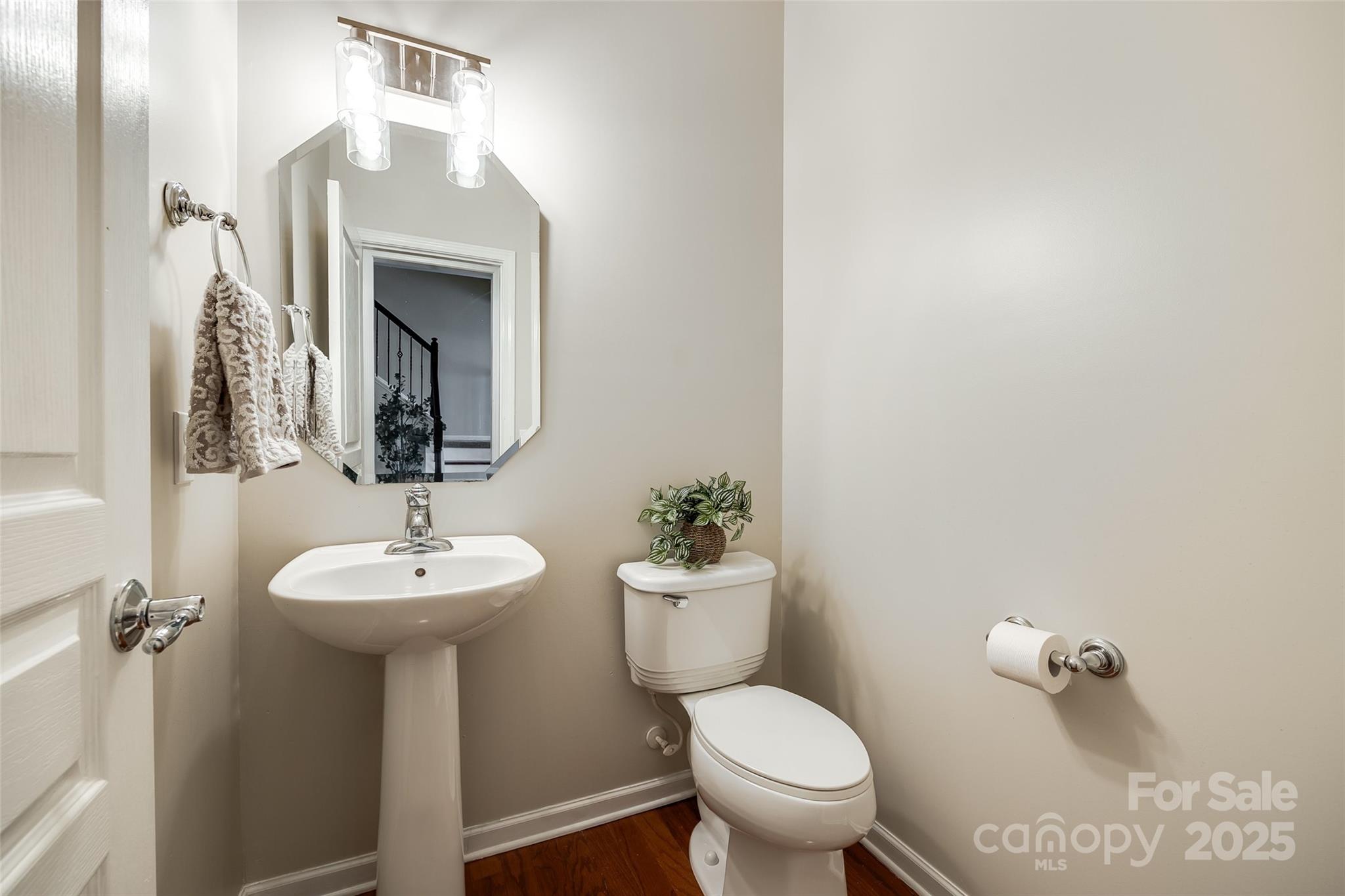 815 Granby Drive Fort Mill, SC 29708 - Photo 9 of 30 a bathroom with a toilet sink and mirror