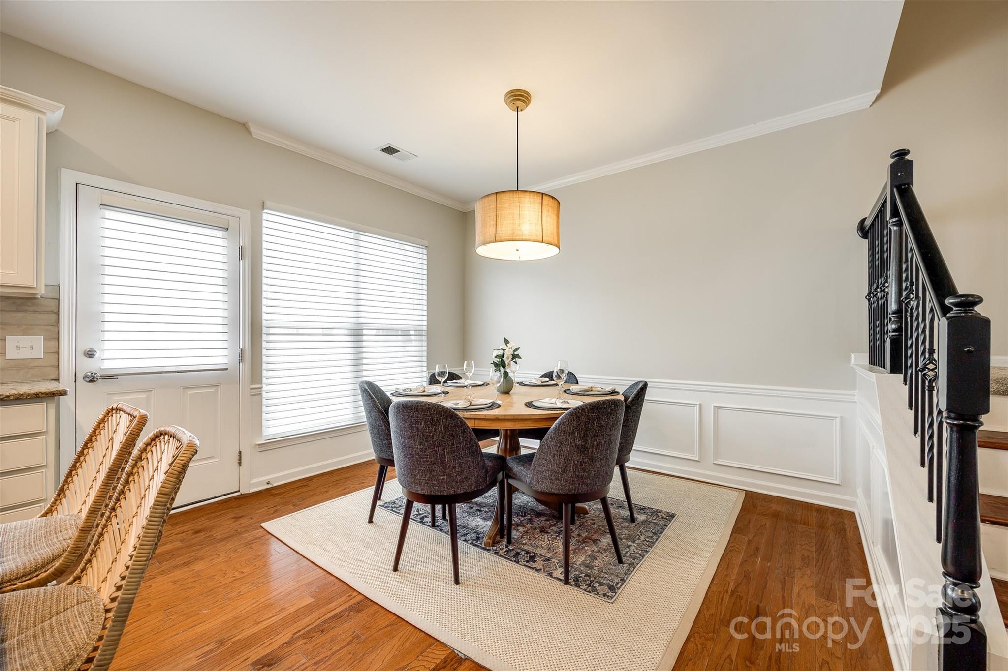 815 Granby Drive Fort Mill, SC 29708 - Photo 10 of 30 a view of a dining room with furniture window and wooden floor