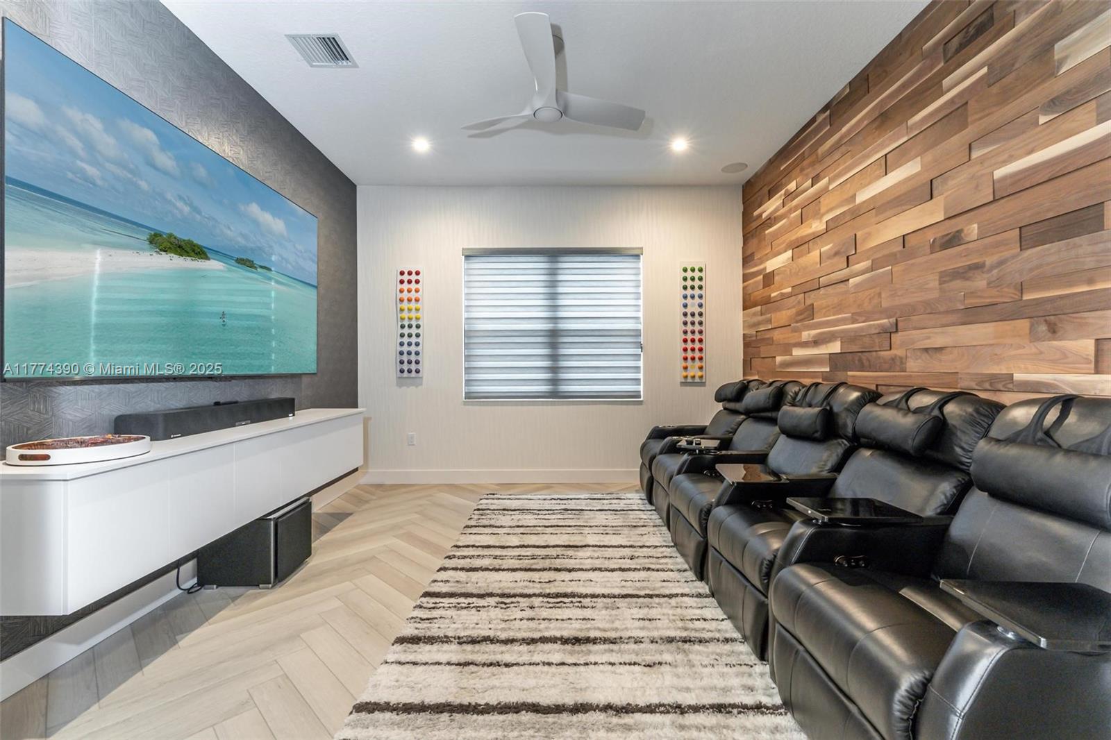8577 Shoreacres Street Boca Raton, FL 33434 - Photo 29 of 67 a living room with furniture and a flat screen tv