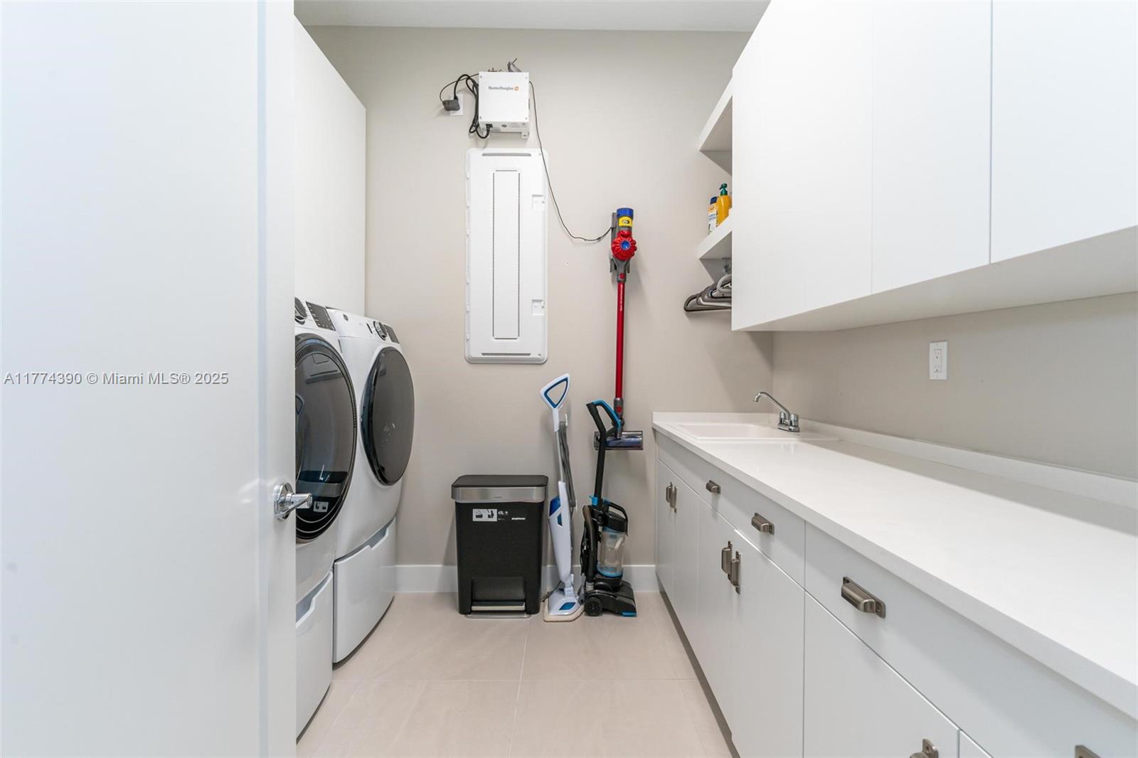 8577 Shoreacres Street Boca Raton, FL 33434 - Photo 40 of 67 a room with storage and utility