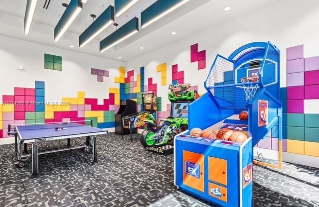 8577 Shoreacres Street Boca Raton, FL 33434 - Photo 62 of 67 a room with musical instruments and air hockey table