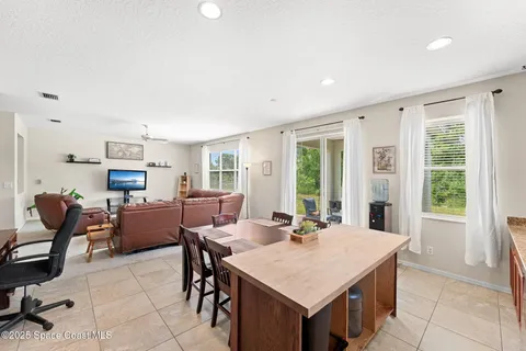 a view of a livingroom with furniture and window
