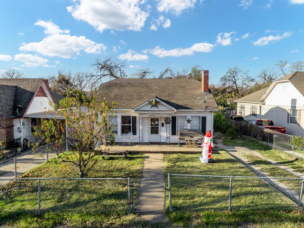 502 North 23rd Street Waco, TX 76707 - Photo 2 of 19 a front view of a house with a yard
