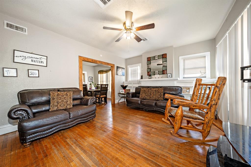 502 North 23rd Street Waco, TX 76707 - Photo 4 of 19 a living room with furniture and wooden floor
