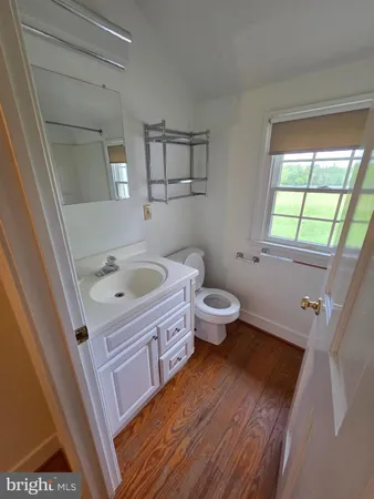 a bathroom with a sink a toilet and a bathtub