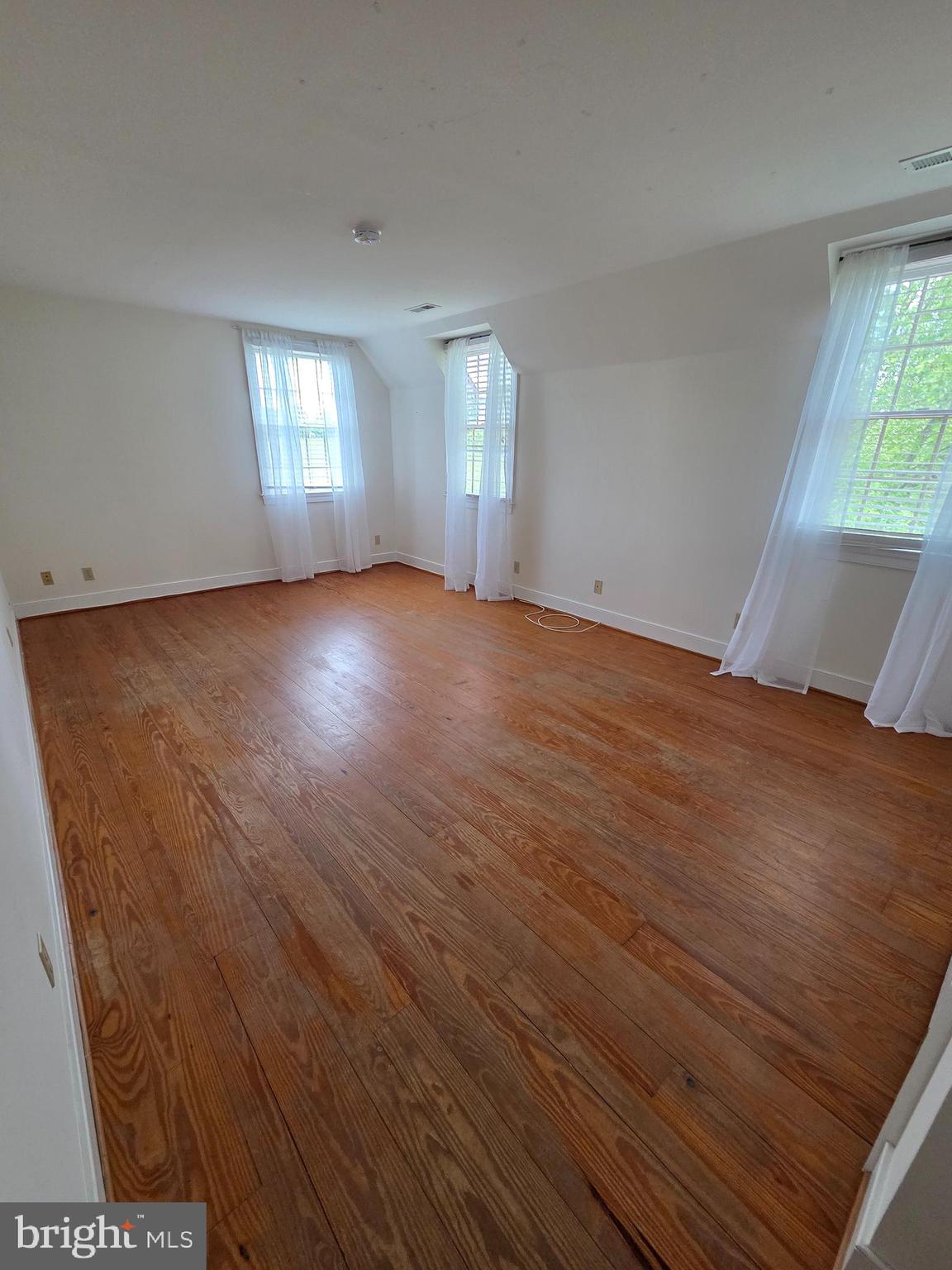 2565 Crenshaw Road Marshall, VA 20115 - Photo 8 of 14 wooden floor in an empty room with a window