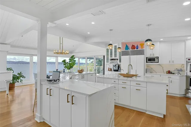 a kitchen with cabinets and window