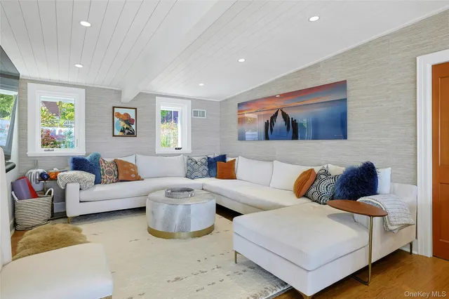 a bathroom with a sink a toilet and tub