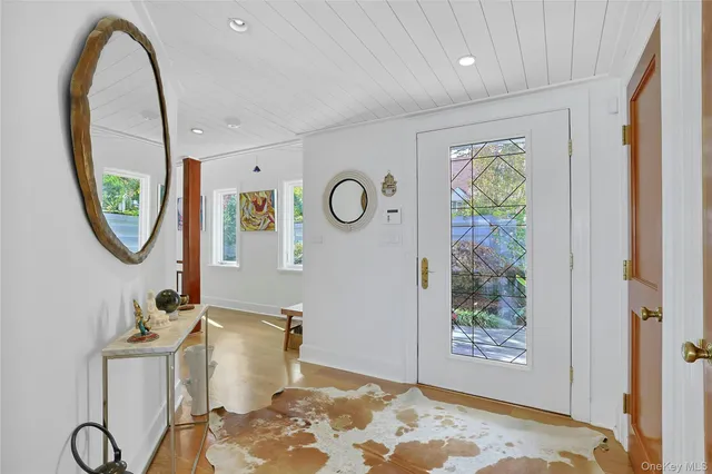 a view of room with furniture and a window