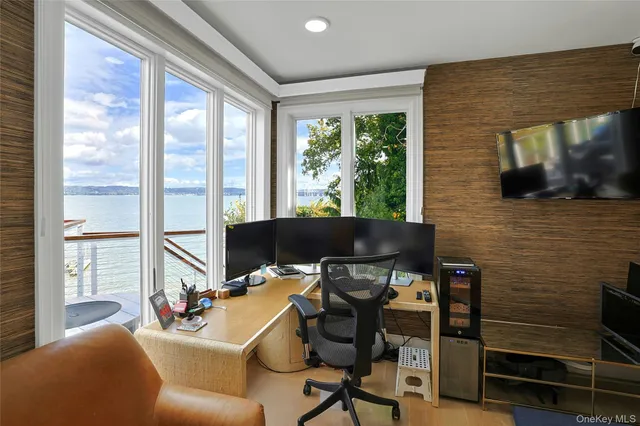 a bedroom with furniture and a chandelier