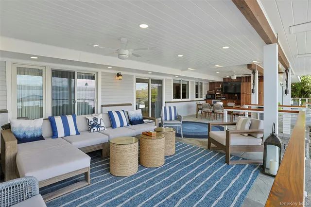 a view of a hallway with seating area