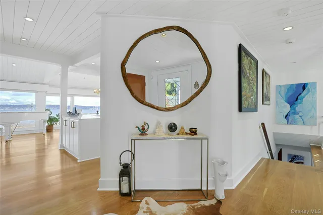 a view of a livingroom with furniture and a wooden floor