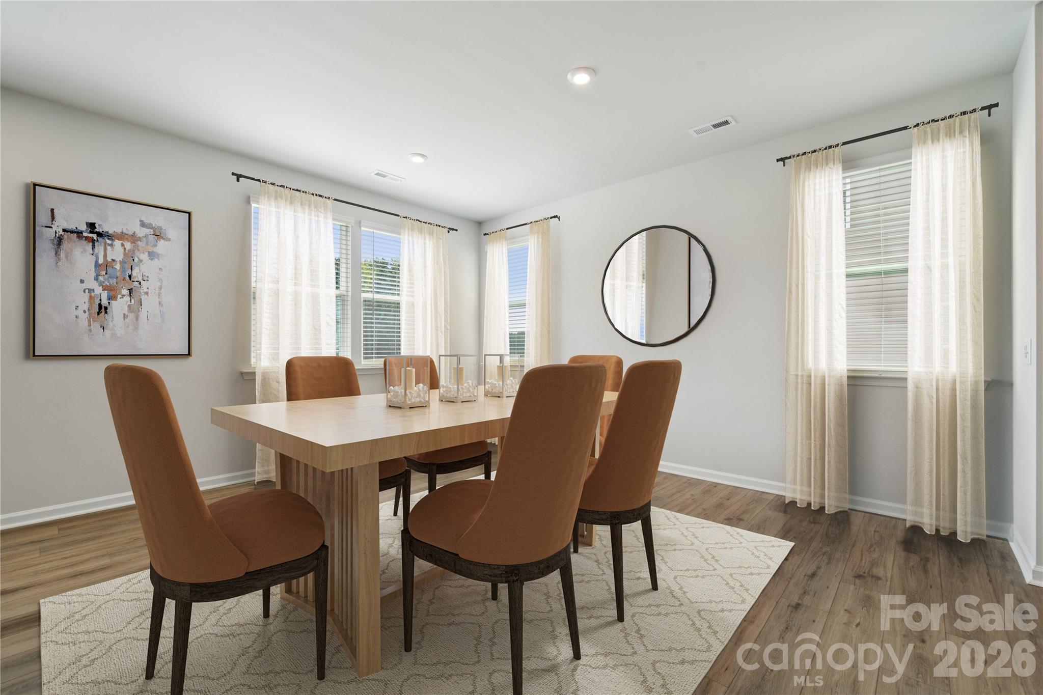 415 Alameda Way Matthews, NC 28104 - Photo 22 of 33 a view of a dining room with furniture and window