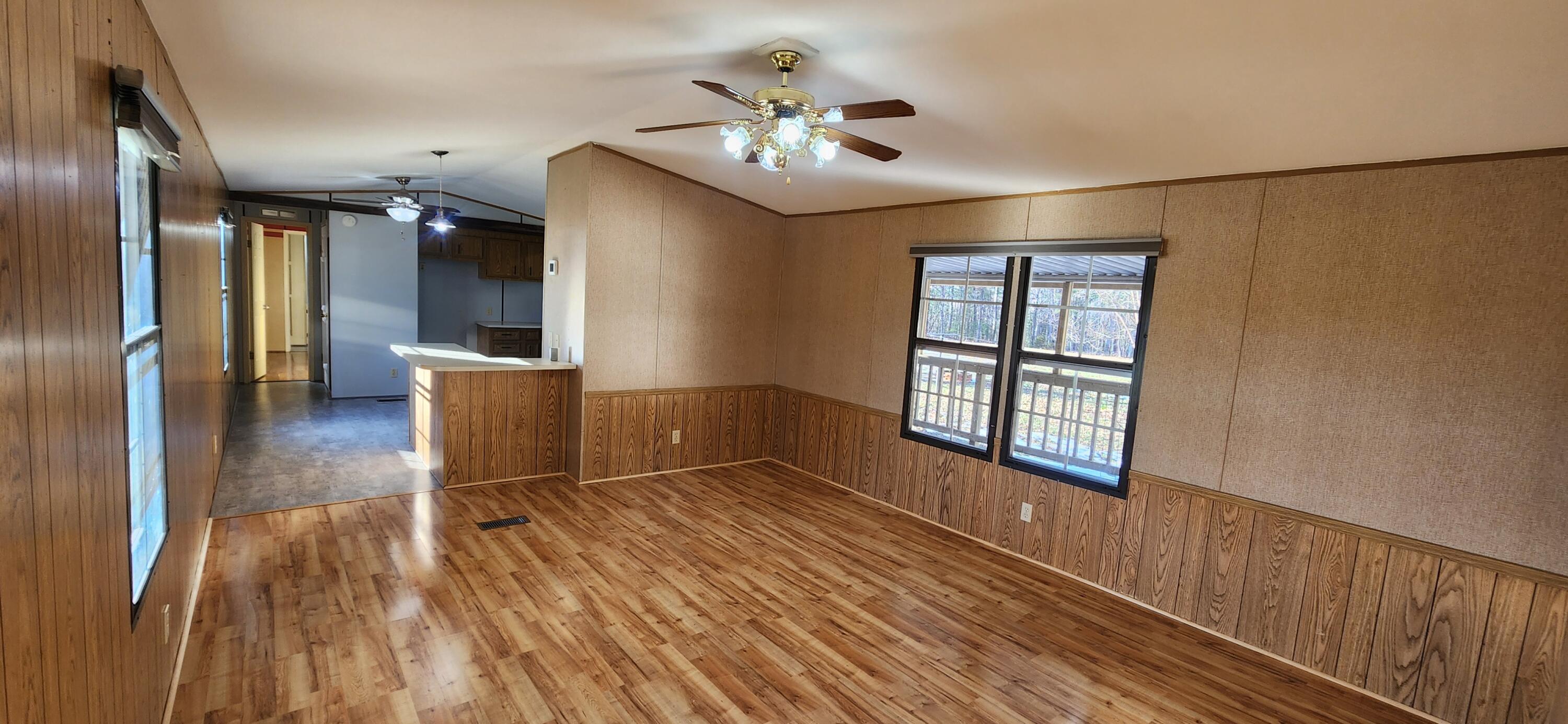 621 Kent Road Wirtz, VA 24184 - Photo 4 of 18 wooden floor in an empty room with a window