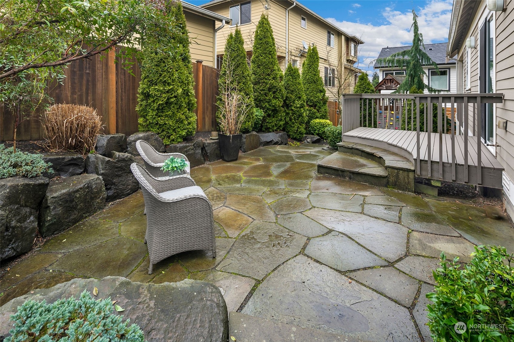 3616 Northeast 65th Street Seattle, WA 98115 - Photo 11 of 40 a view of a patio with couches table and chairs and potted plants