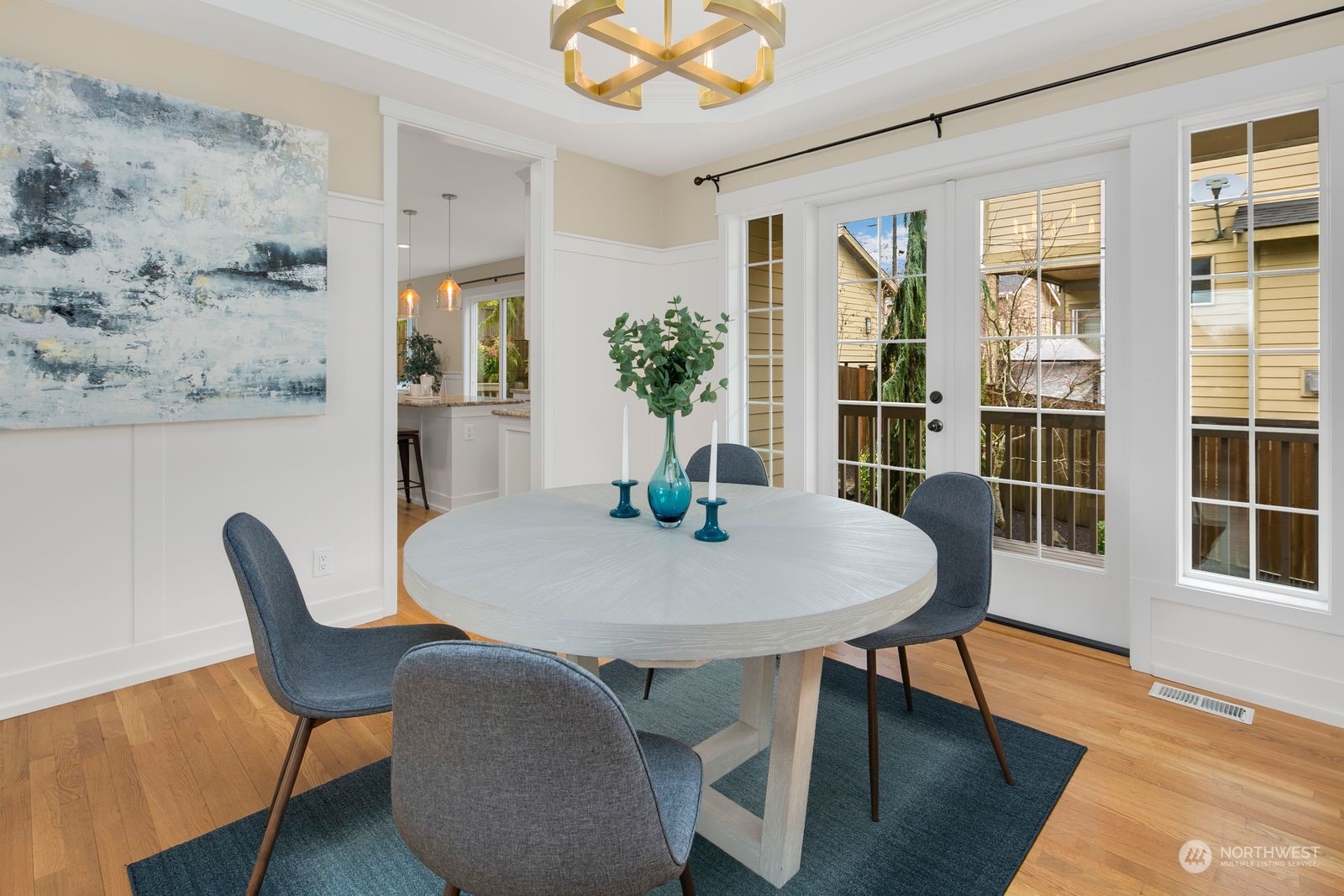 3616 Northeast 65th Street Seattle, WA 98115 - Photo 16 of 40 a view of a dining room with furniture window and wooden floor