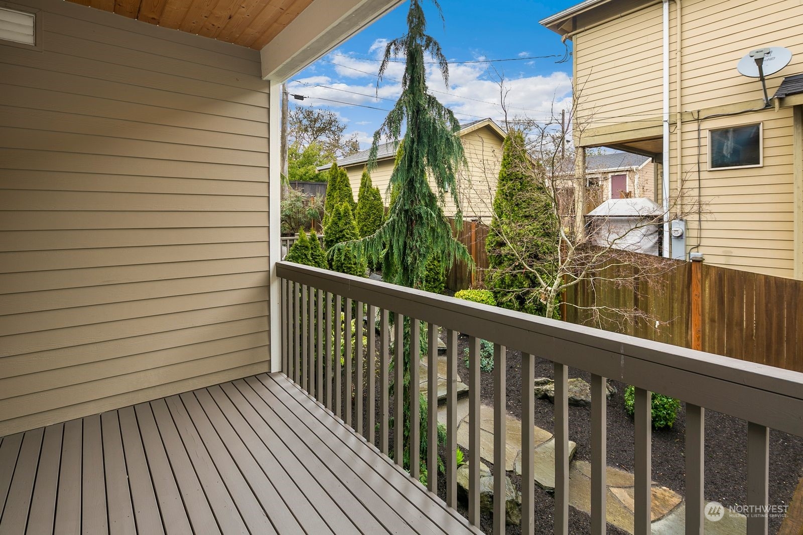 3616 Northeast 65th Street Seattle, WA 98115 - Photo 17 of 40 a view of a balcony with wooden floor