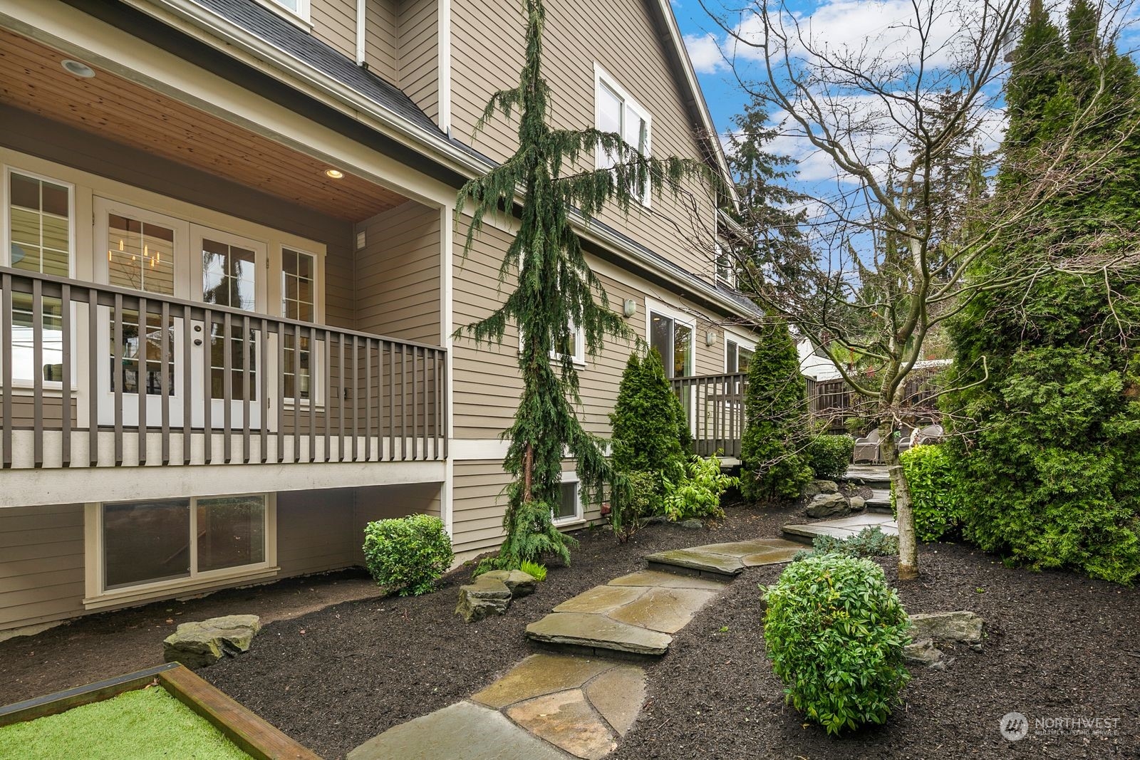 3616 Northeast 65th Street Seattle, WA 98115 - Photo 18 of 40 a front view of a house with garden