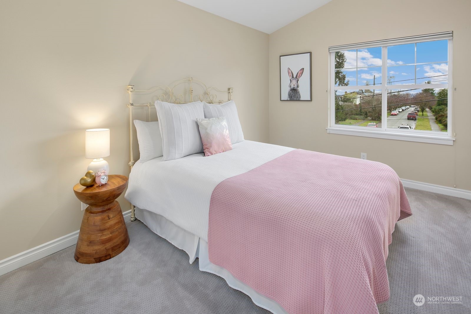 3616 Northeast 65th Street Seattle, WA 98115 - Photo 28 of 40 a bedroom with a bed and a window