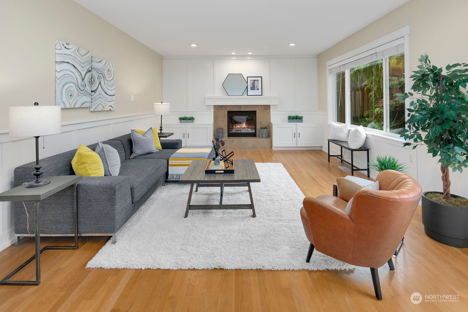 3616 Northeast 65th Street Seattle, WA 98115 - Photo 4 of 40 a living room with furniture and a fireplace