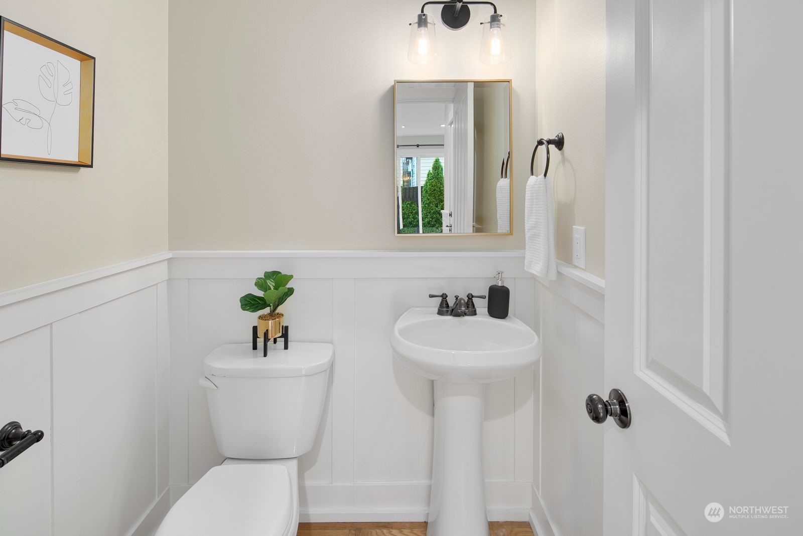 3616 Northeast 65th Street Seattle, WA 98115 - Photo 9 of 40 a bathroom with a toilet sink and mirror