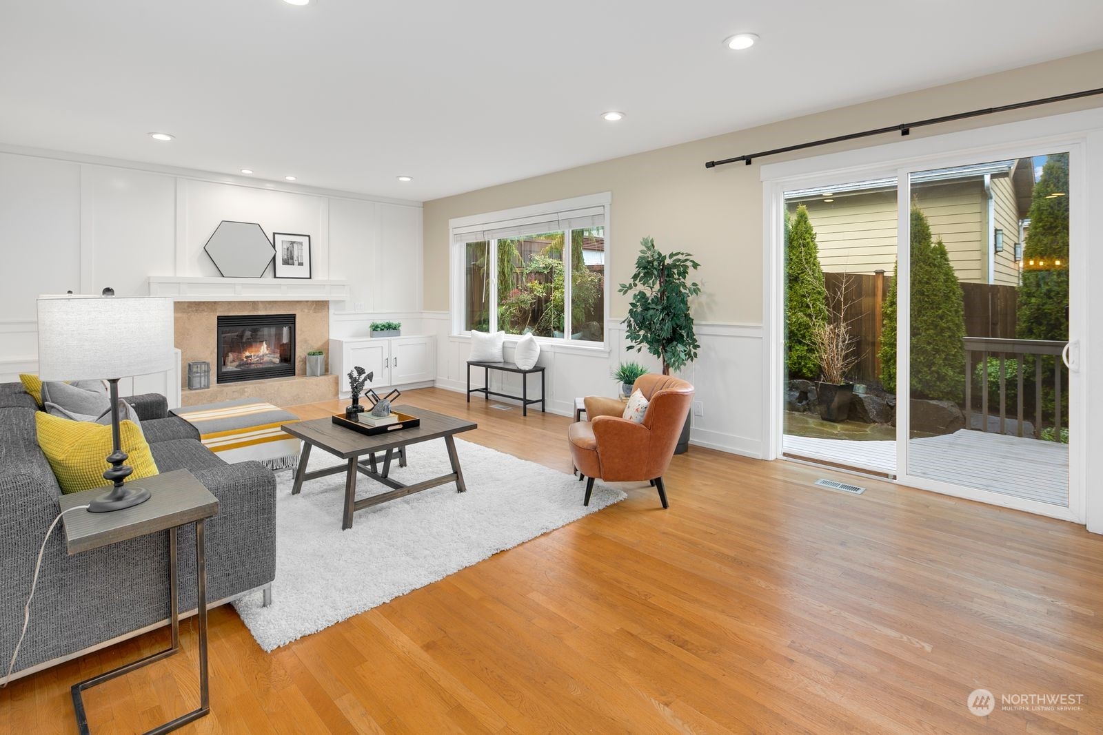 3616 Northeast 65th Street Seattle, WA 98115 - Photo 10 of 40 a living room with furniture and a fireplace