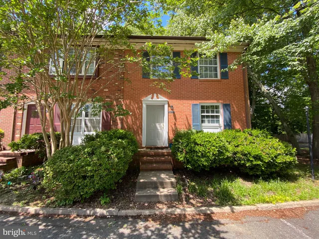 front view of a house with a garden