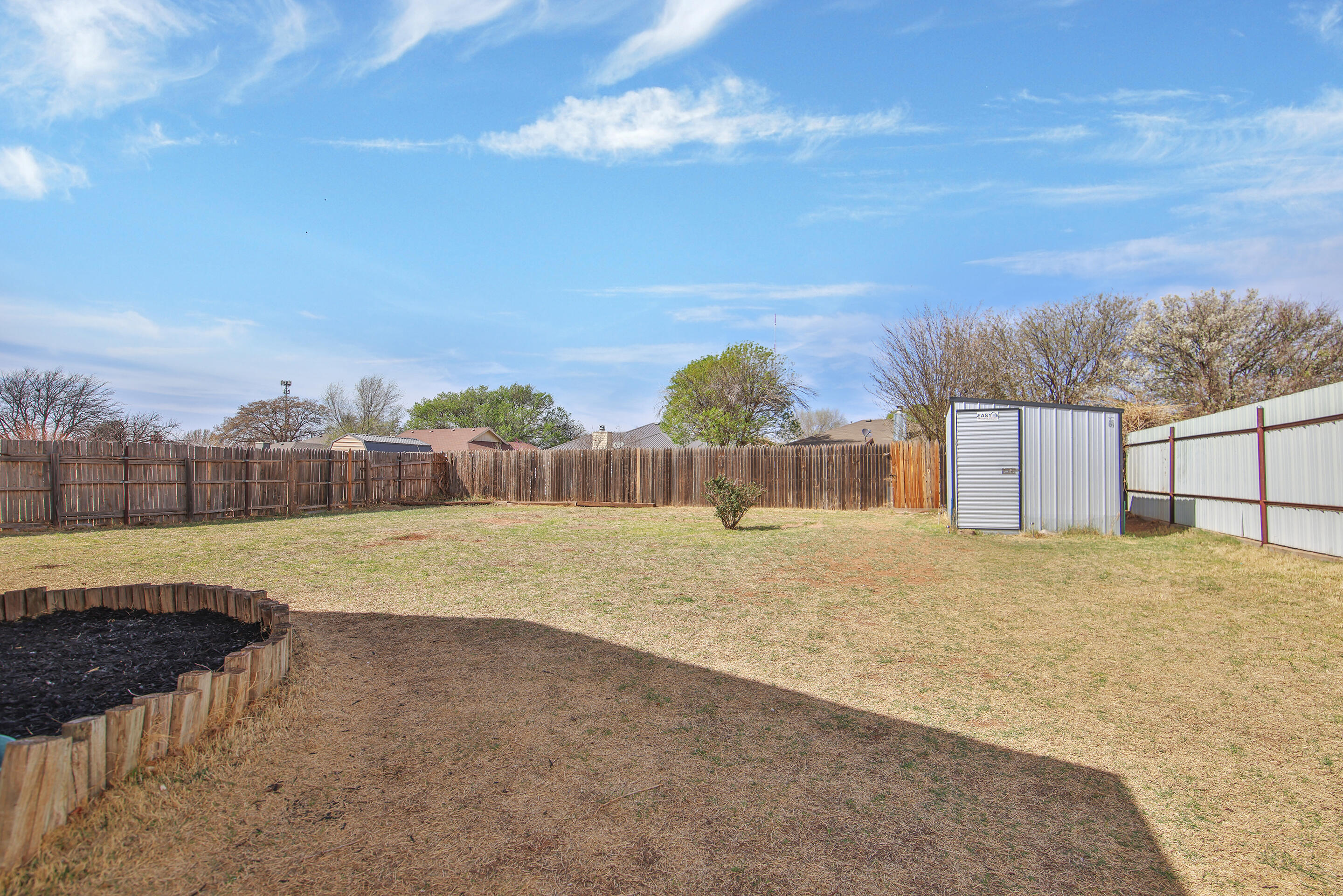 2216 86th Street Lubbock, TX 79423 - Photo 31 of 36 a view of a yard