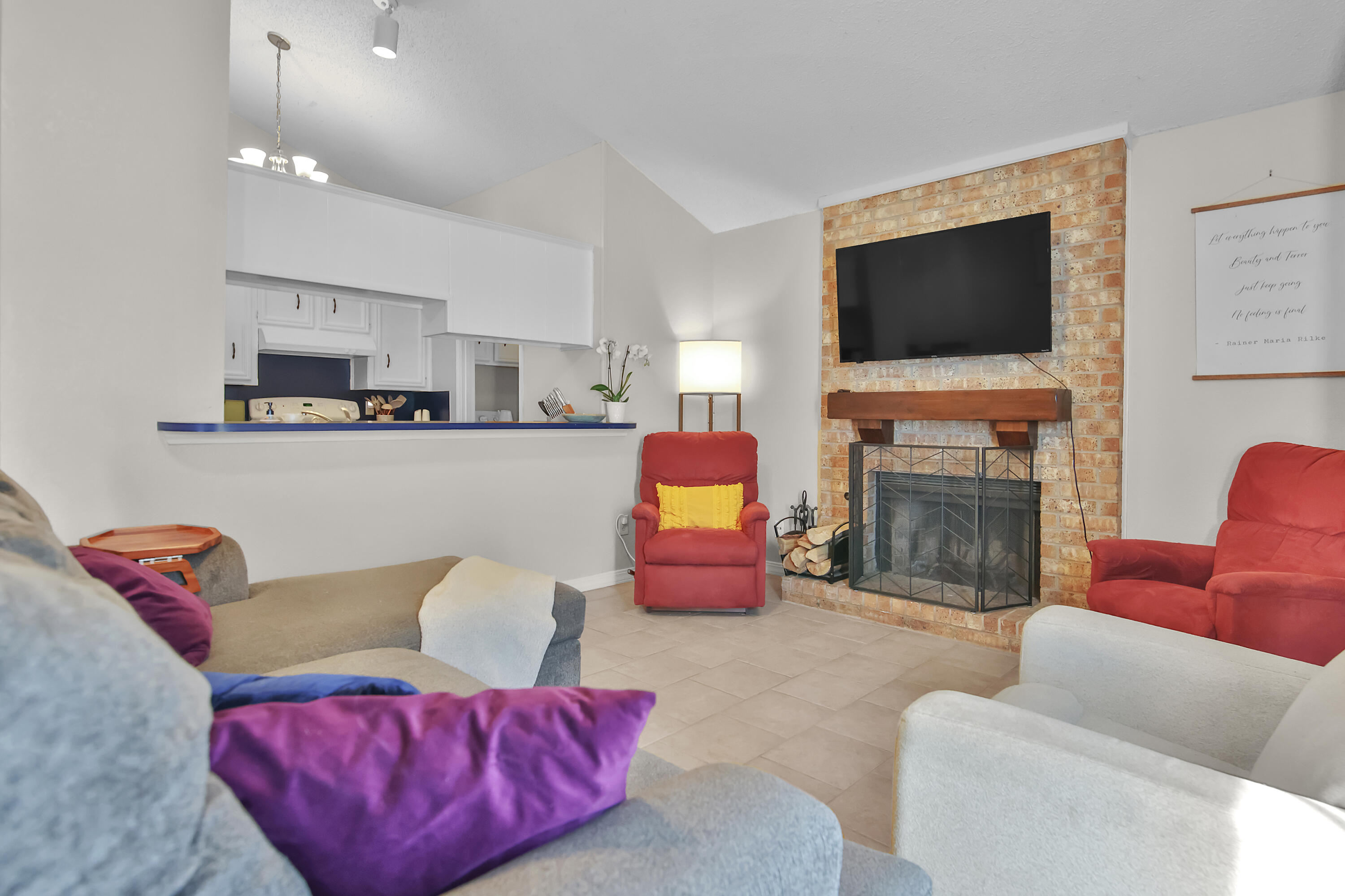 2216 86th Street Lubbock, TX 79423 - Photo 6 of 36 a living room with furniture fireplace and flat screen tv