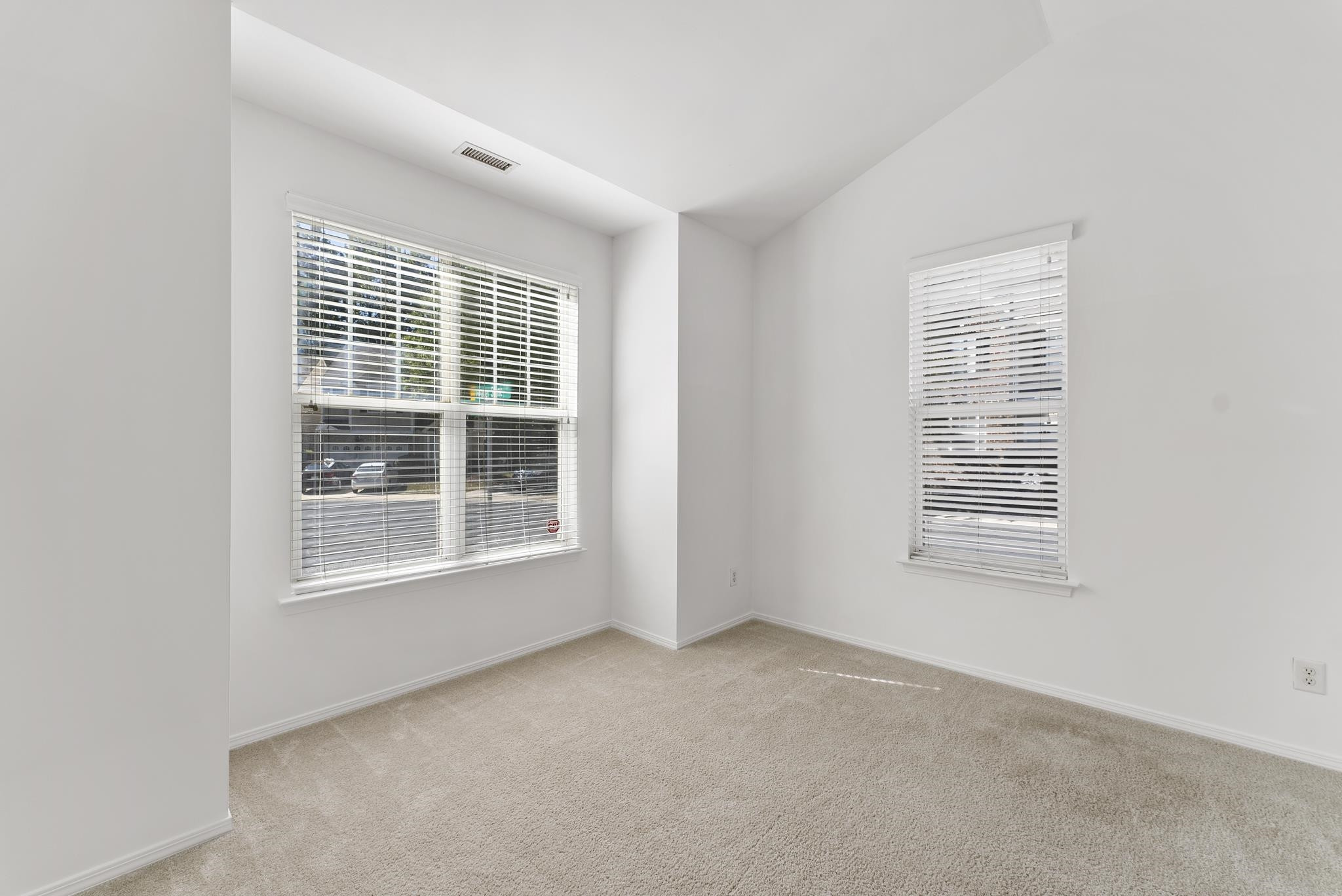 8510 Pillar Gate Lane Raleigh, NC 27613 - Photo 17 of 33 a view of an empty room with a window