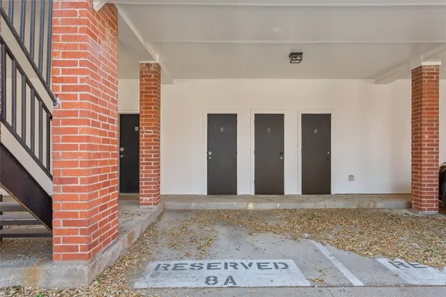 a view of a brick house with a door